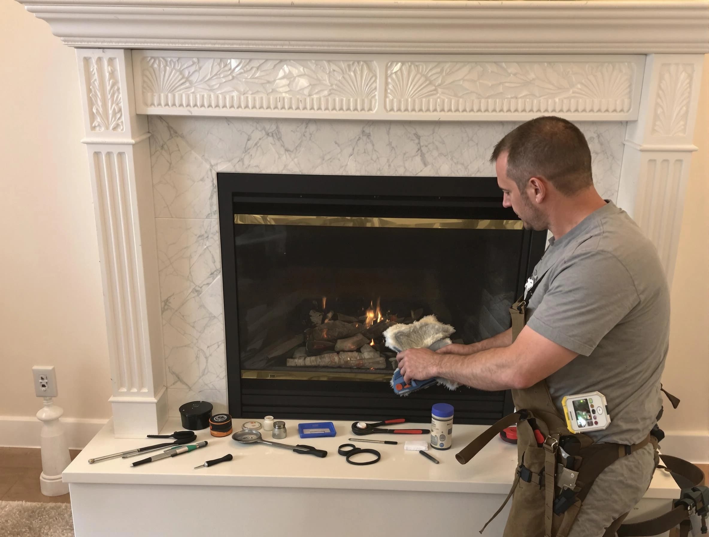 Harrisville Chimney Sweep performing fireplace maintenance in Harrisville, UT