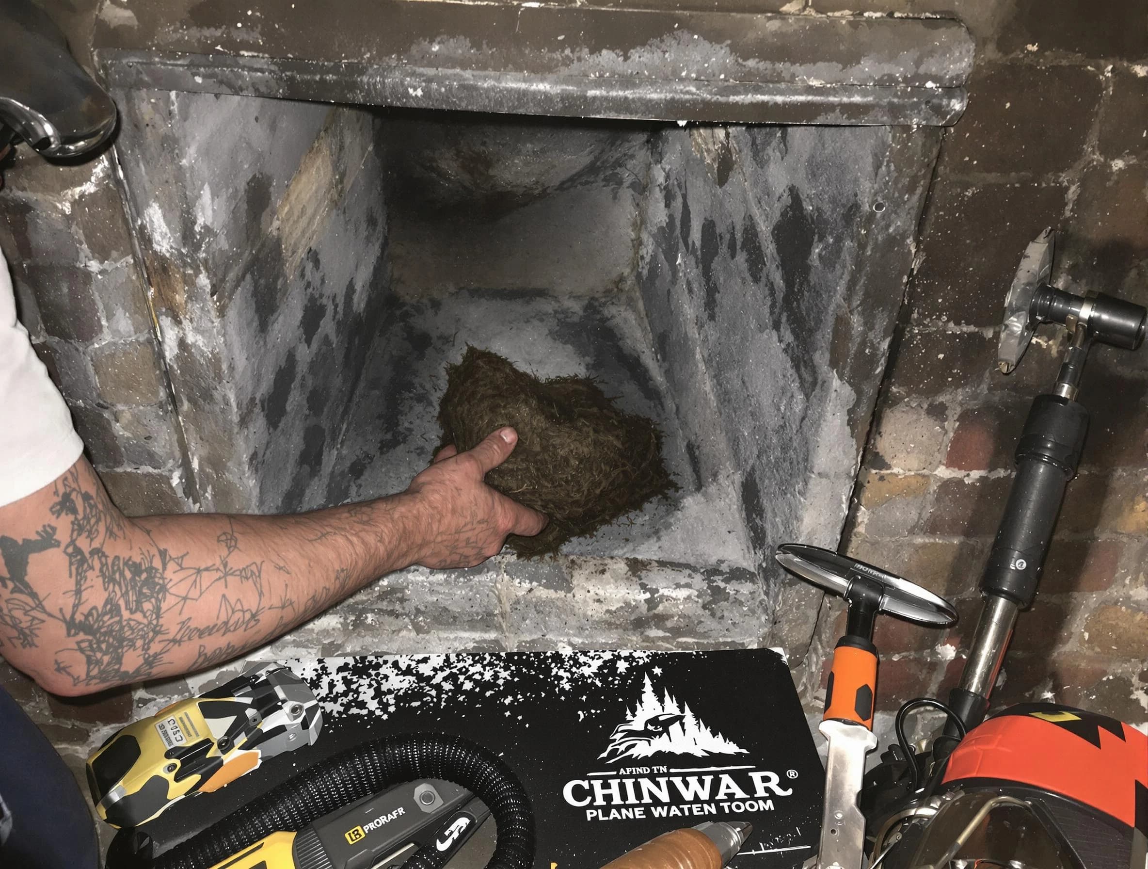 Harrisville Chimney Sweep safely removing debris and screening chimney in Harrisville, UT